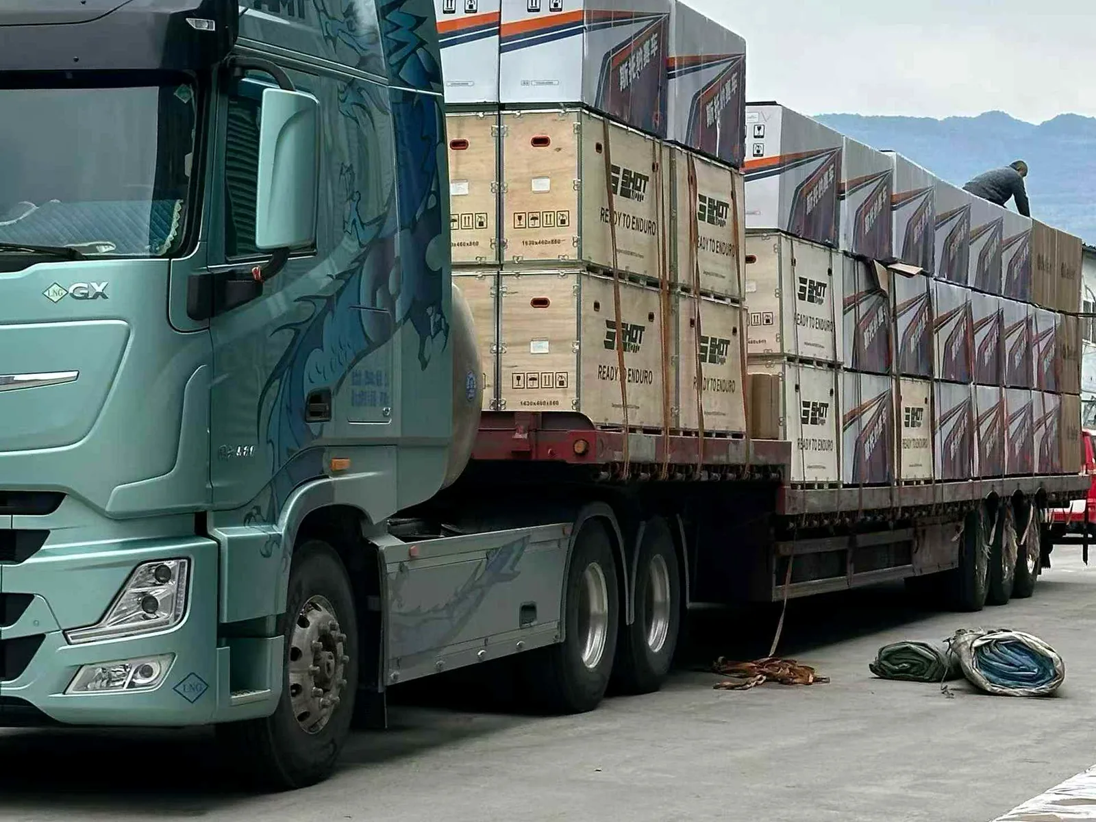 FCDC Motor truck loaded with packed motorcycle export cartons