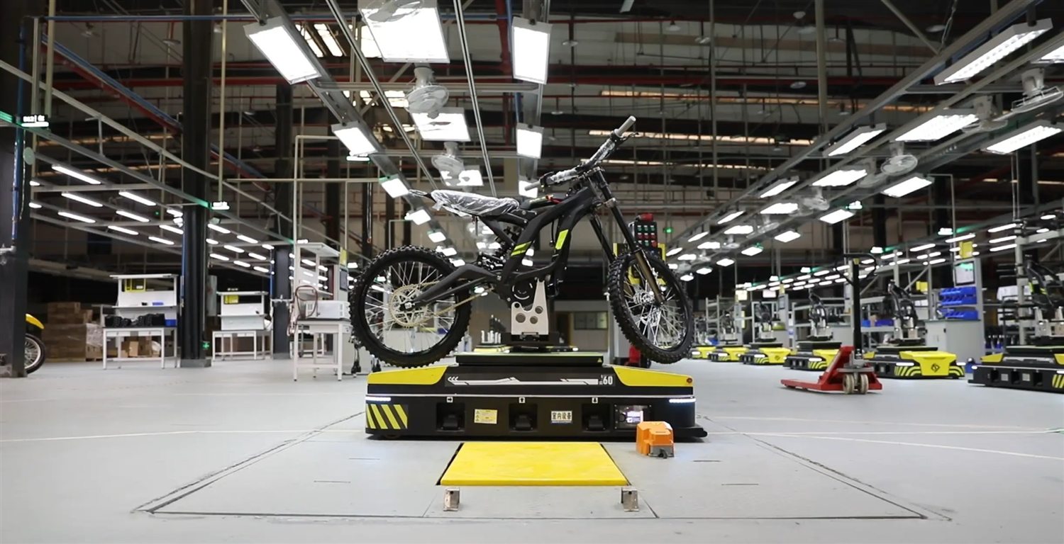 FCDC Motor automated motorcycle assembly station inside a modern production workshop