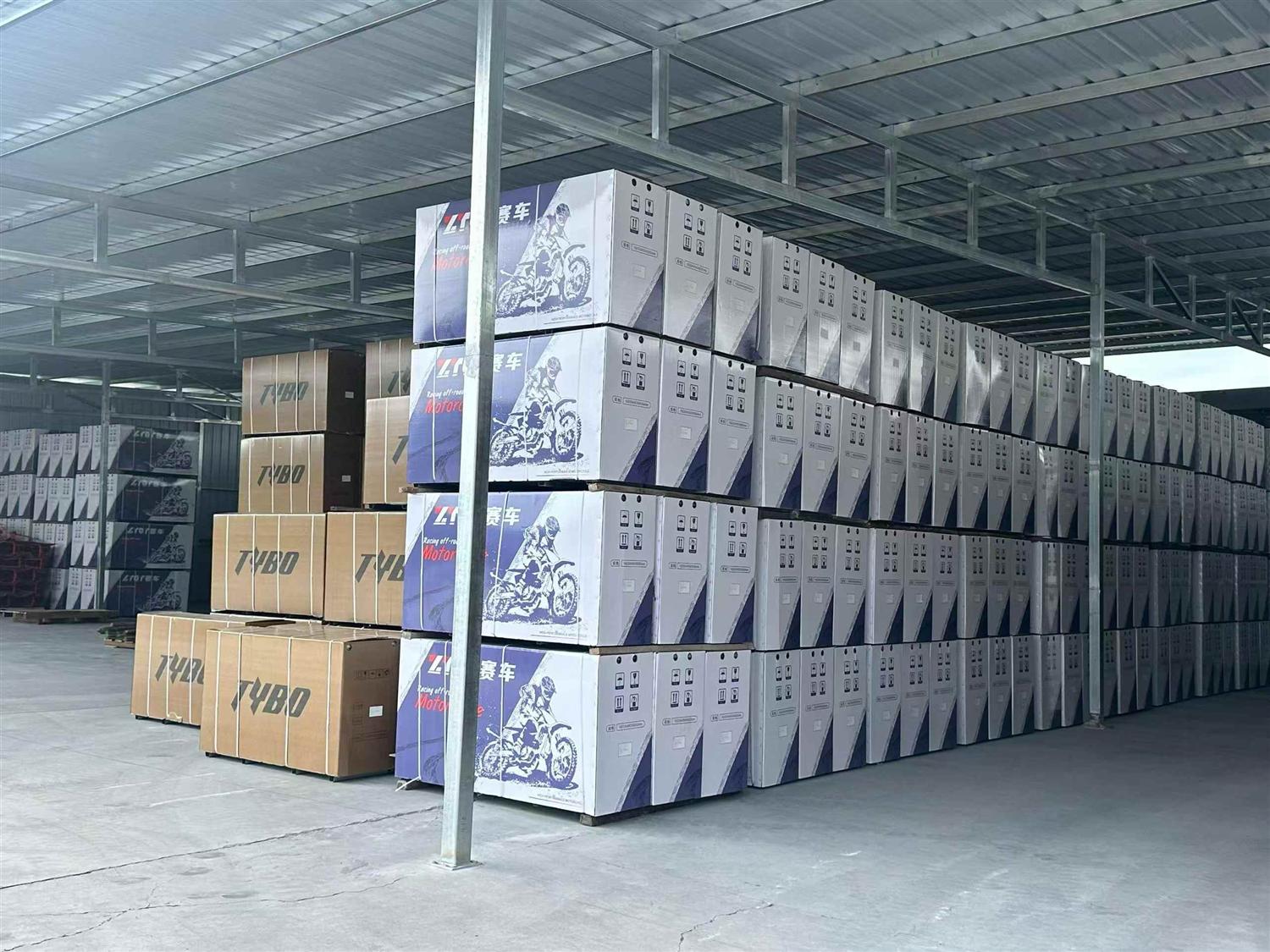 FCDC Motor packed motorcycle inventory stacked for dealer export orders