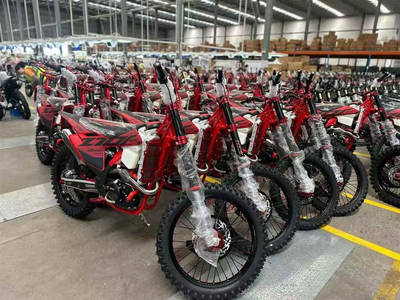 FCDC Motor warehouse lineup of red off-road motorcycles for wholesale buyers