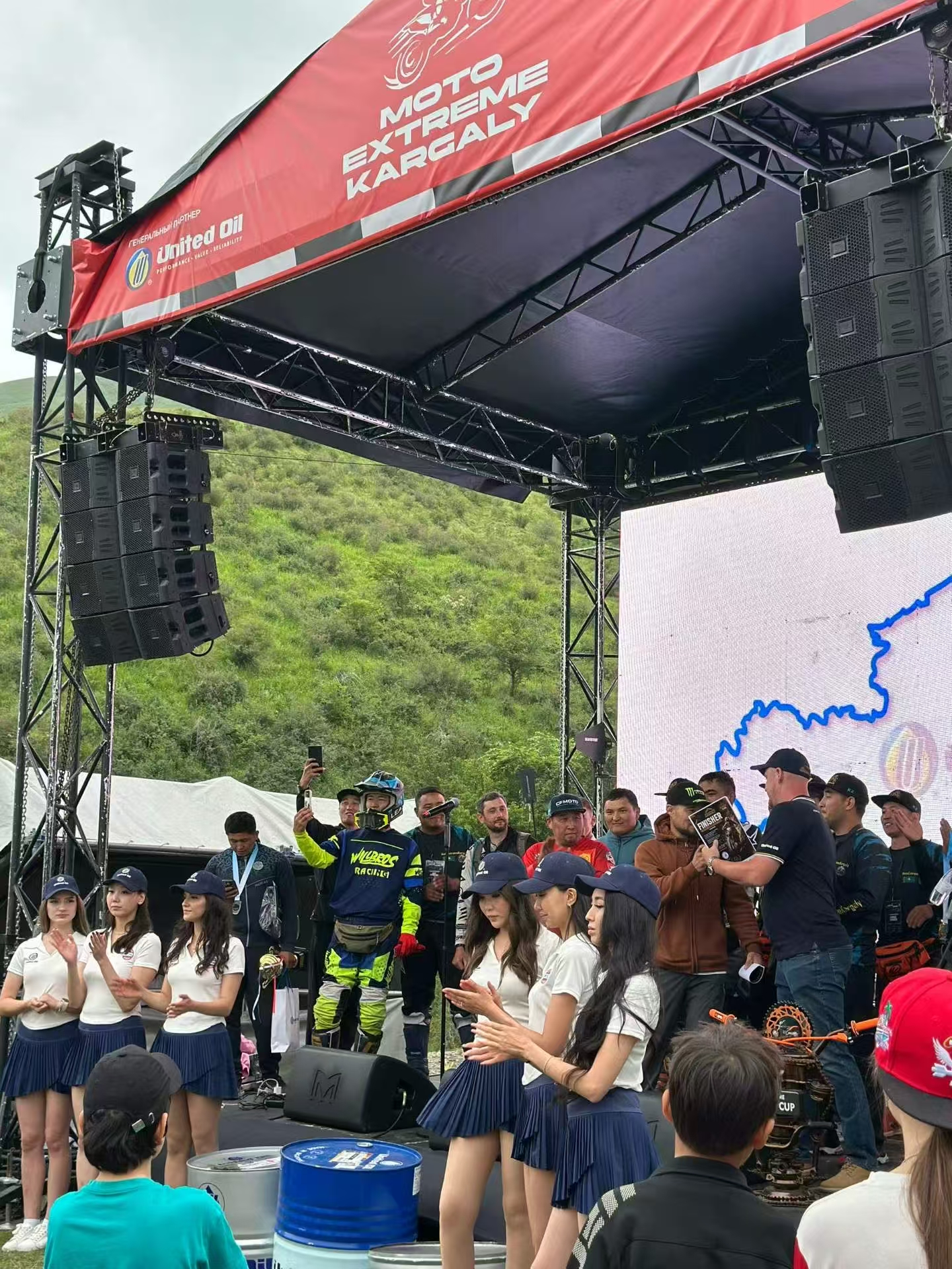 Motorcycle festival podium and ecosystem proof